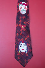 Frida and a sugar skull in red and black