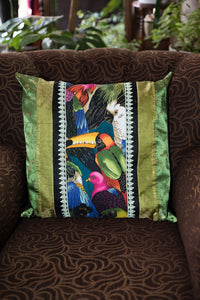 Tropical birds cushion in green