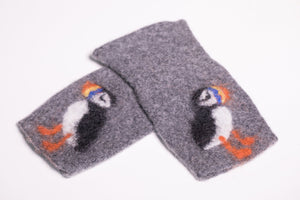 Warm and soft fingerless half mittens with a hand felted little puffin. Colour cliff.